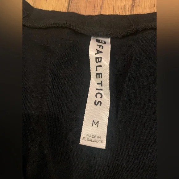 Fabletics Curved Hem Cut Out Side Detail Black Long Sleeve Top - Picture 2 of 6